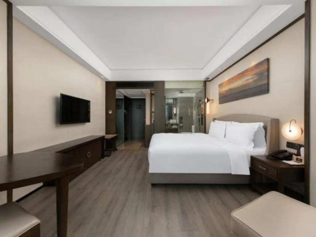 Bed in Zhuhai Starlight Hotel