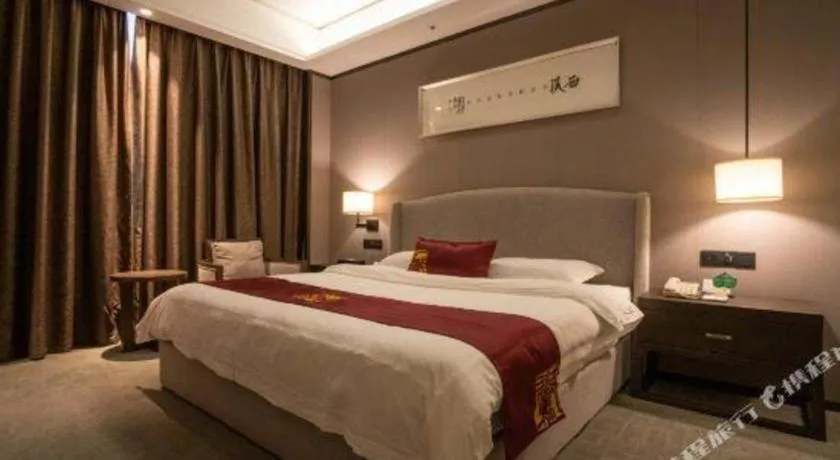 Bed in Zhuhai Starlight Hotel