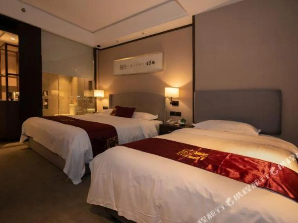 Bed in Zhuhai Starlight Hotel