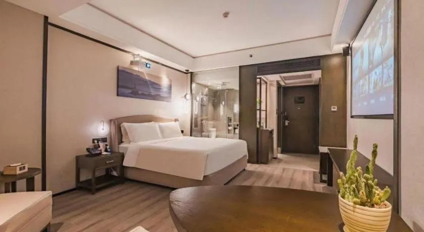 Bed in Zhuhai Starlight Hotel