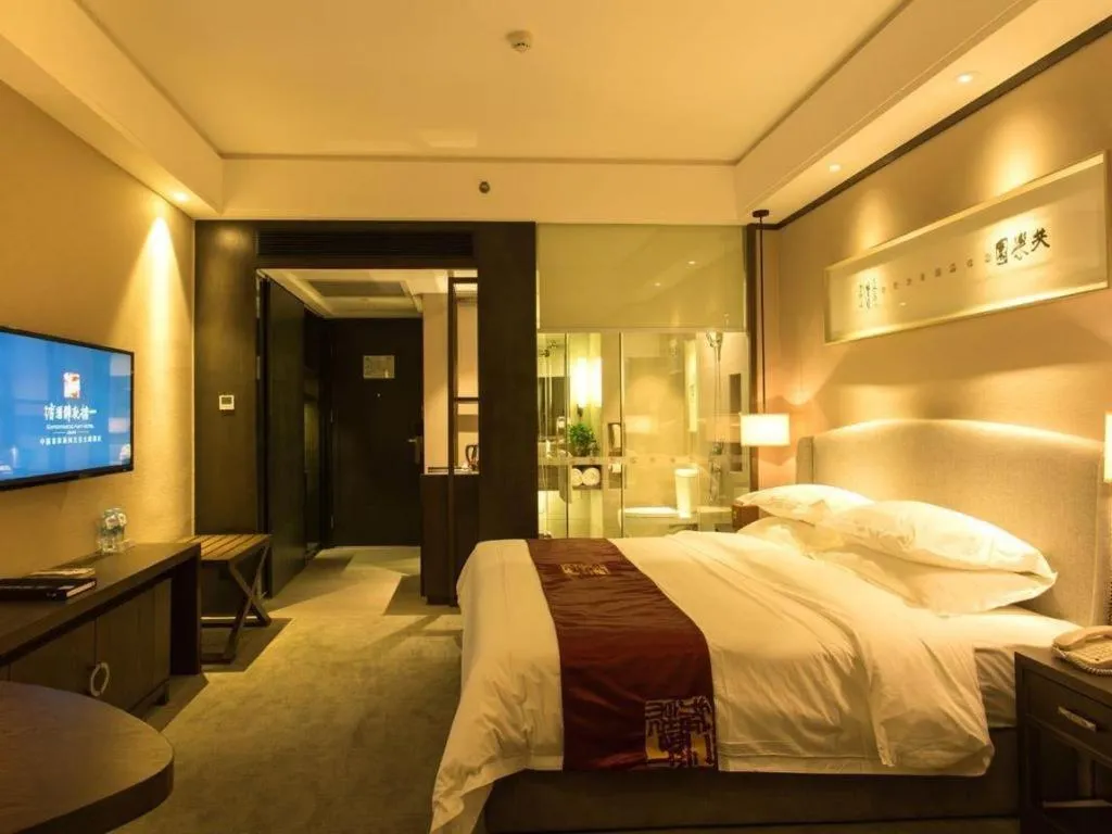 Bed in Zhuhai Starlight Hotel