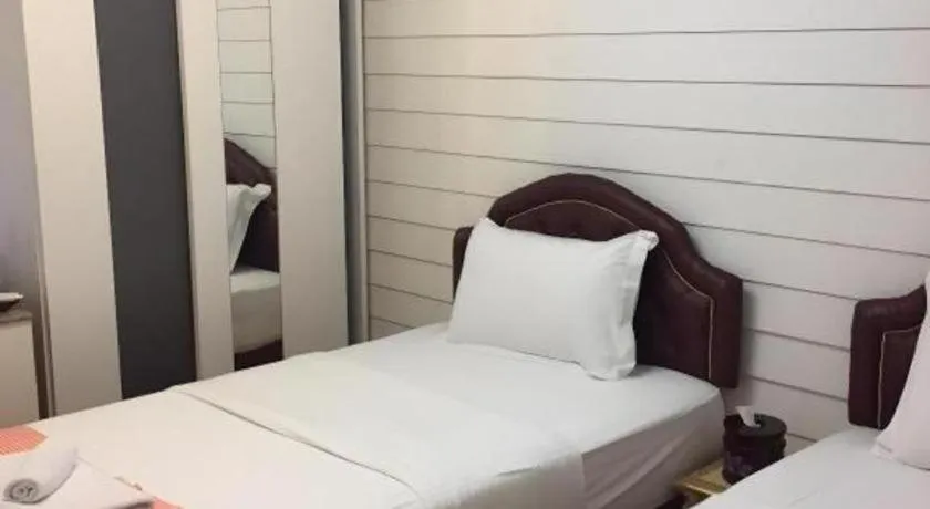 Bed in Ban Thungdang Housetel Bangkok