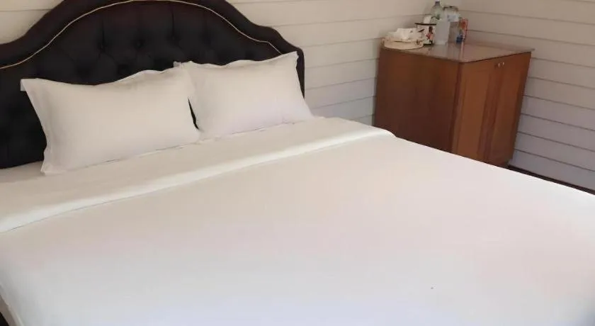 Bed in Ban Thungdang Housetel Bangkok