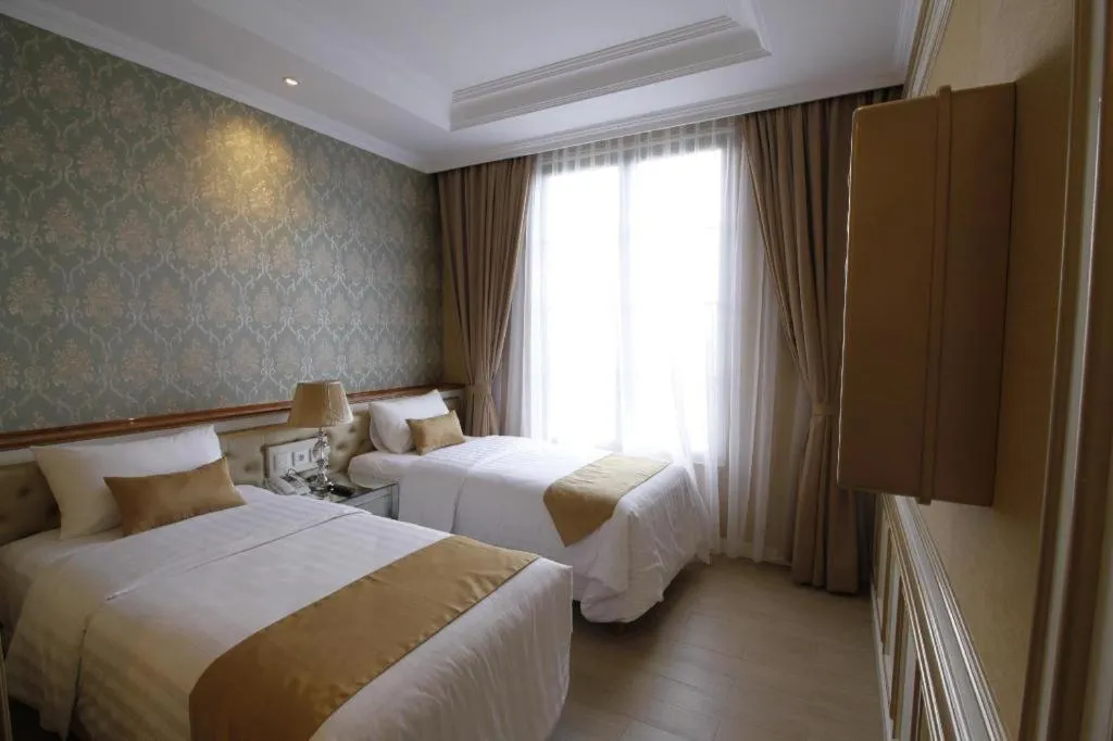 Bed in d'primahotel Bandung