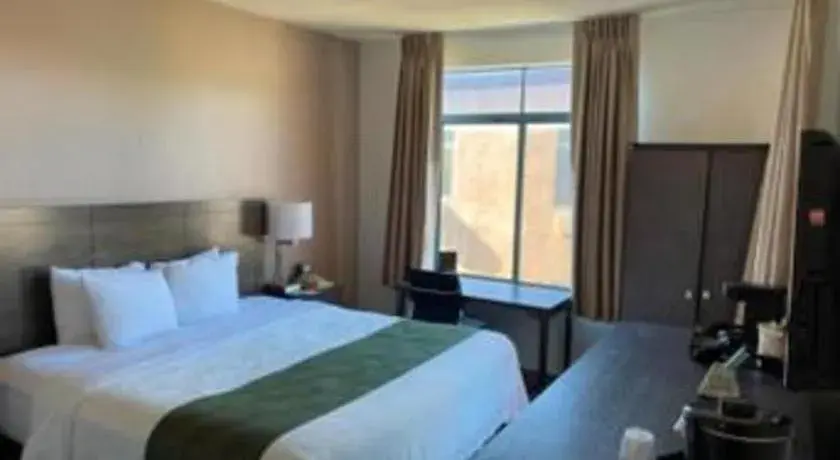 Bed in Ramada Suites by Wyndham San Diego Bed in Ramada Suites by Wyndham San Diego