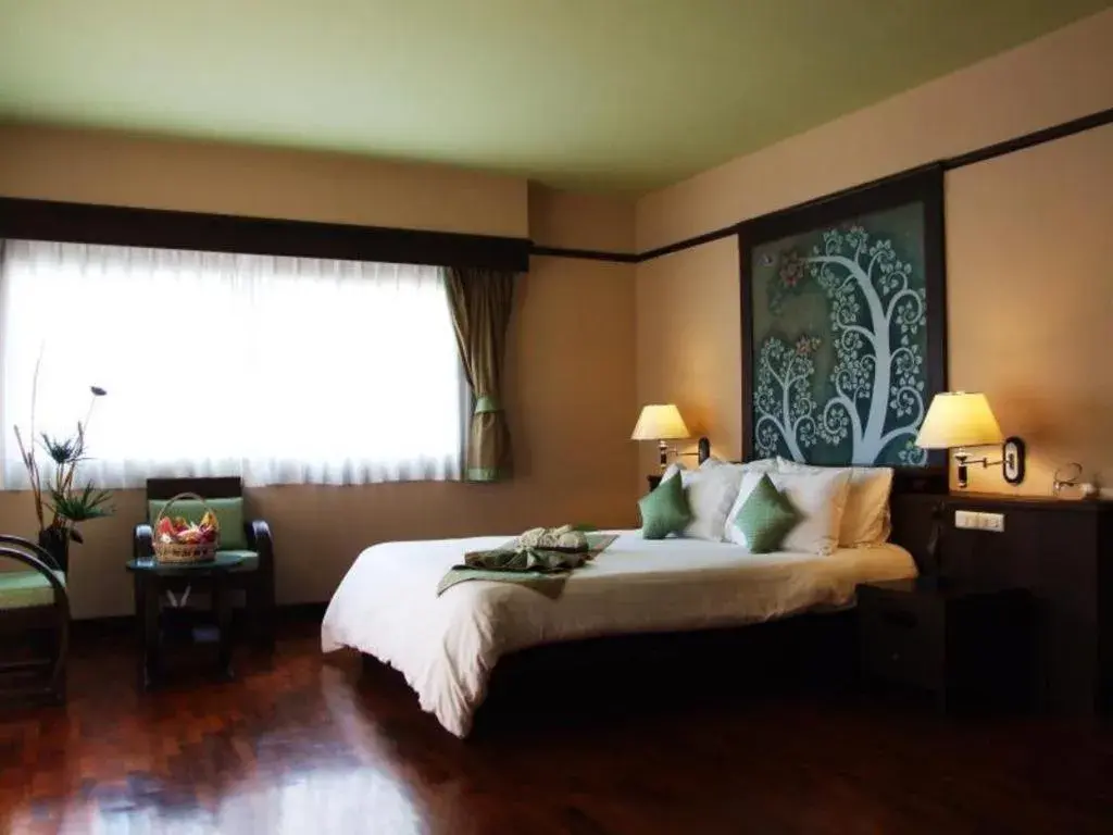 Bed in Sarita Chalet and Spa Hotel Bed in Sarita Chalet and Spa Hotel