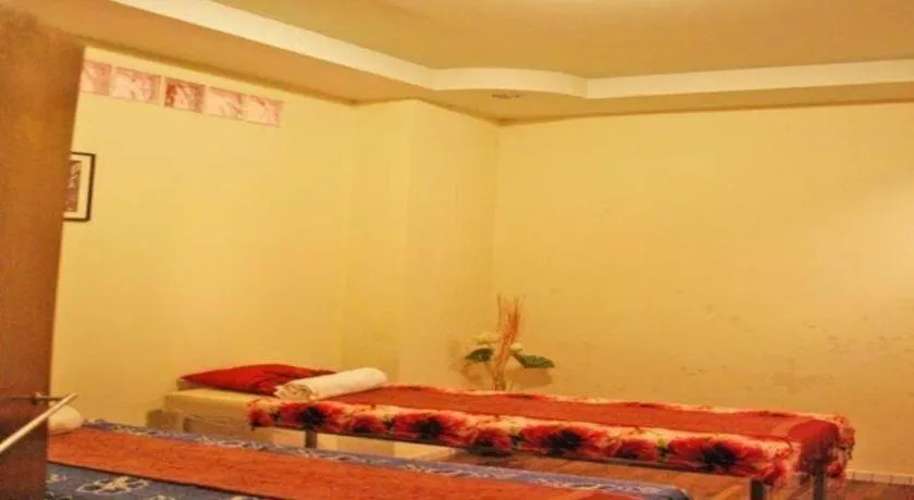 Bed in Sarita Chalet and Spa Hotel