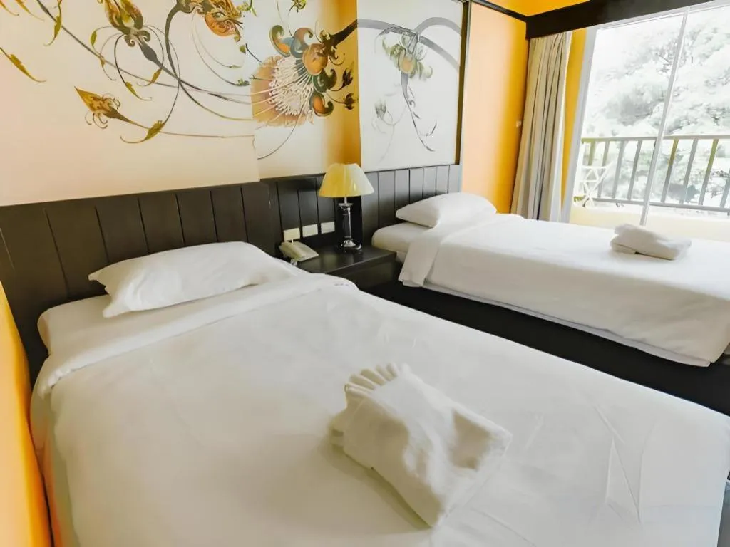 Bed in Sarita Chalet and Spa Hotel