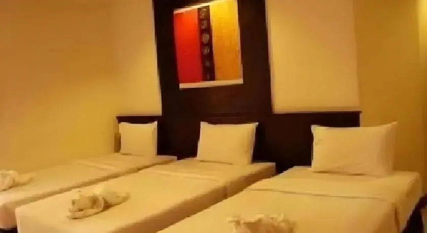 Bed in Grand Pinnacle Hotel Bed in Grand Pinnacle Hotel