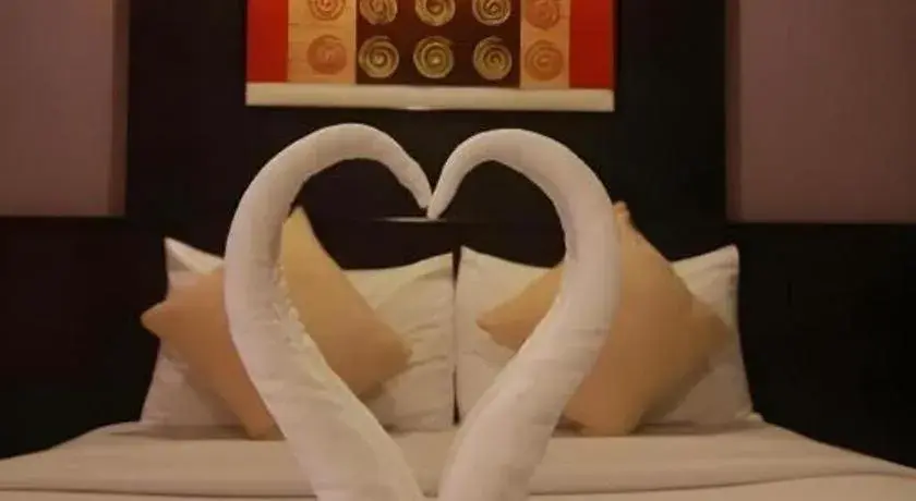 Bed in Grand Pinnacle Hotel Bed in Grand Pinnacle Hotel