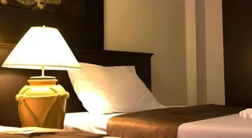 Bed in Grand Pinnacle Hotel Bed in Grand Pinnacle Hotel