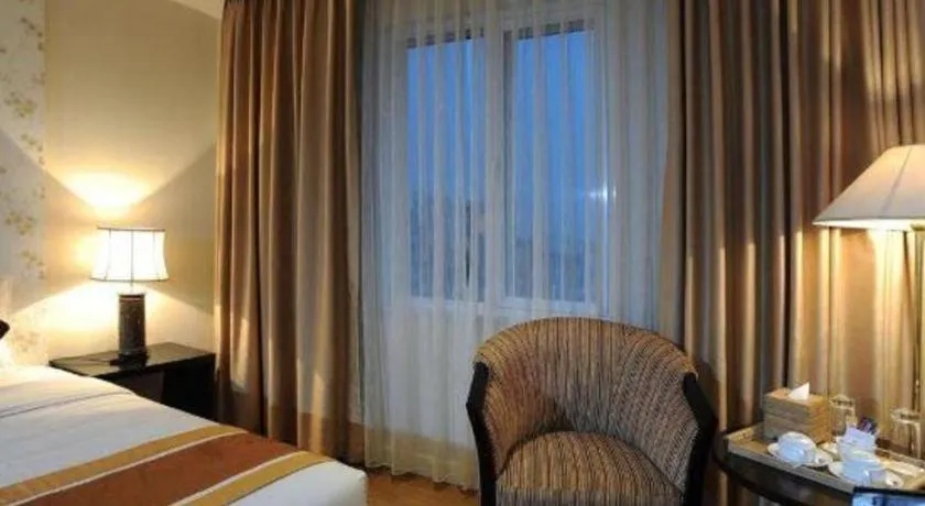 Bed in Cosiana Hotel