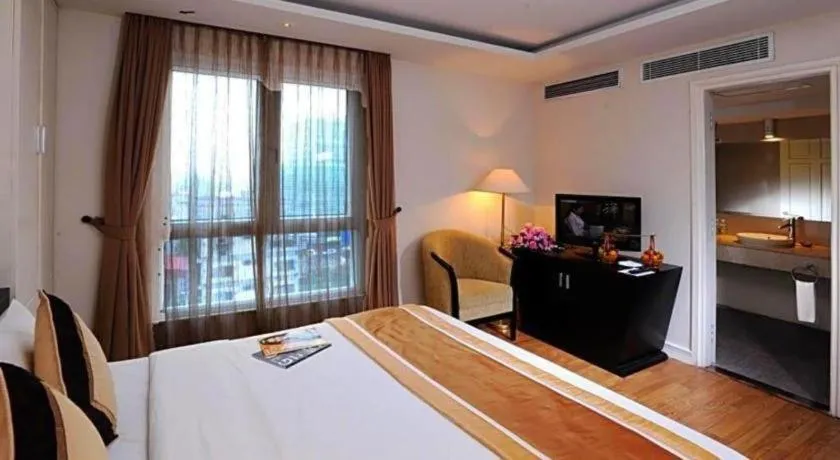 Bed in Cosiana Hotel