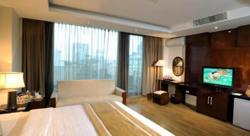 Bed in Cosiana Hotel