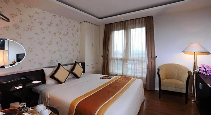 Bed in Cosiana Hotel