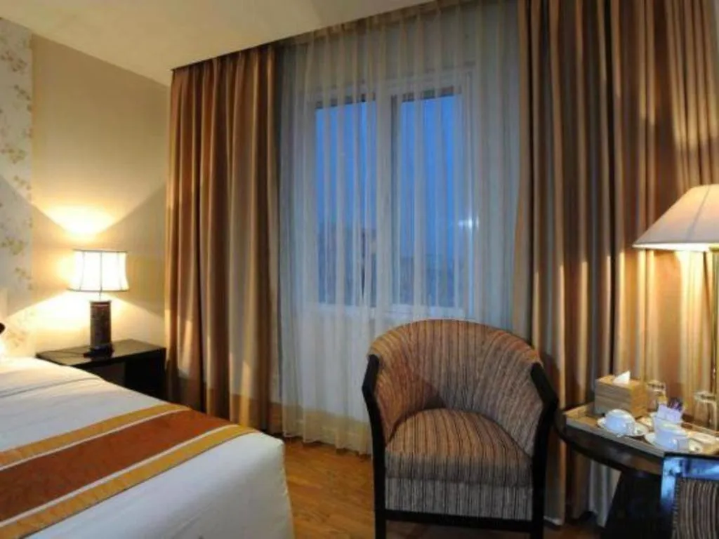 Bed in Cosiana Hotel