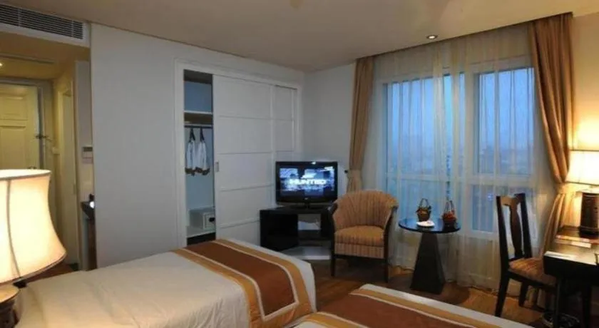 Bed in Cosiana Hotel