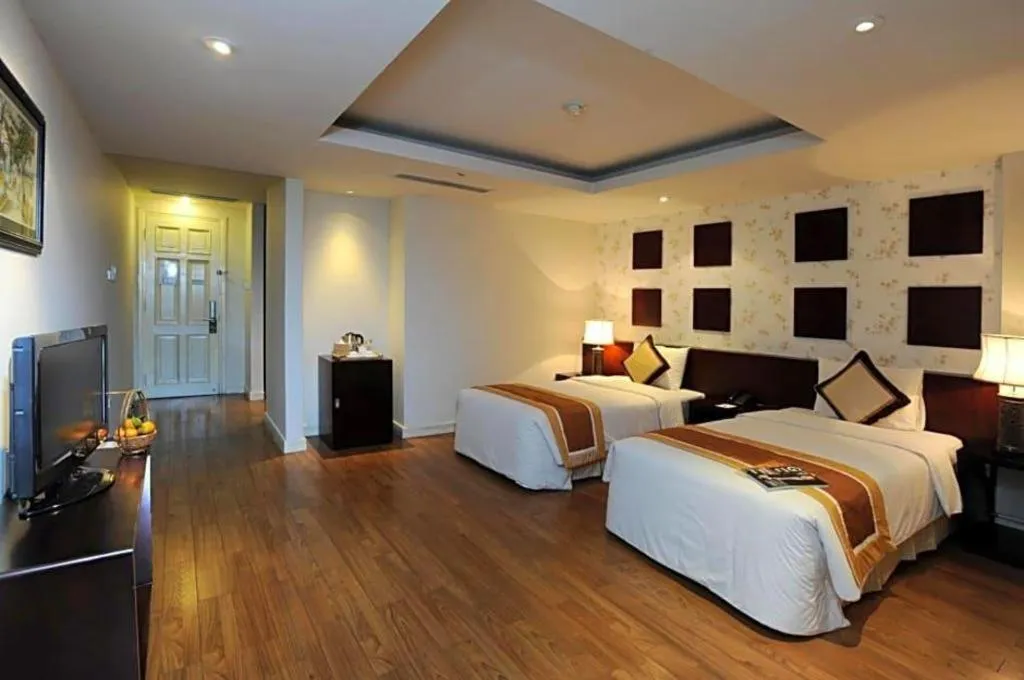 Bed in Cosiana Hotel