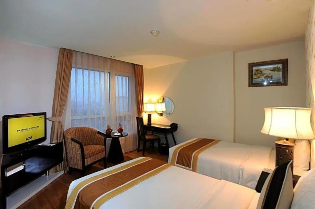 Bed in Cosiana Hotel