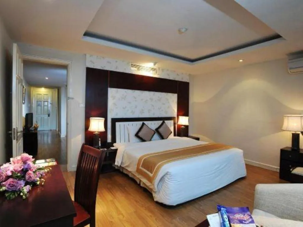 Bed in Cosiana Hotel