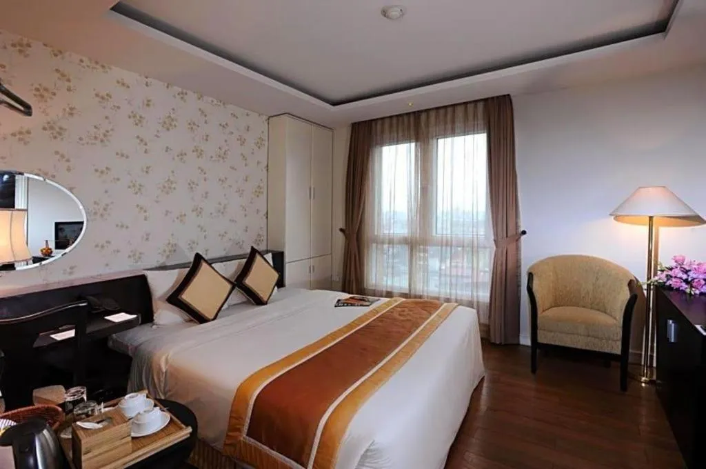 Bed in Cosiana Hotel