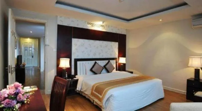 Bed in Cosiana Hotel