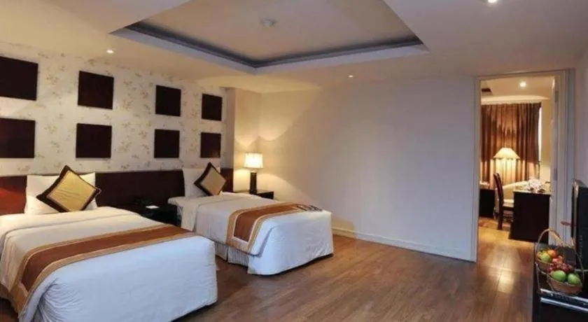 Bed in Cosiana Hotel