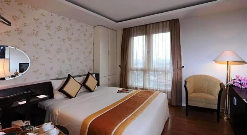 Bed in Cosiana Hotel