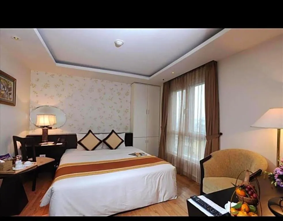 Bed in Cosiana Hotel