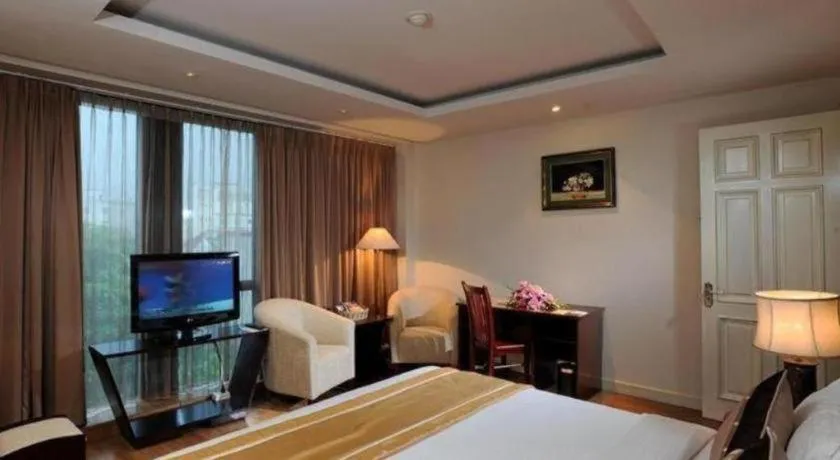 Bed in Cosiana Hotel