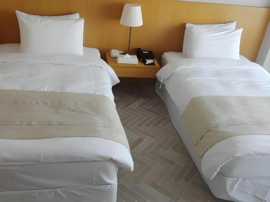 Bed in Hotel Illua