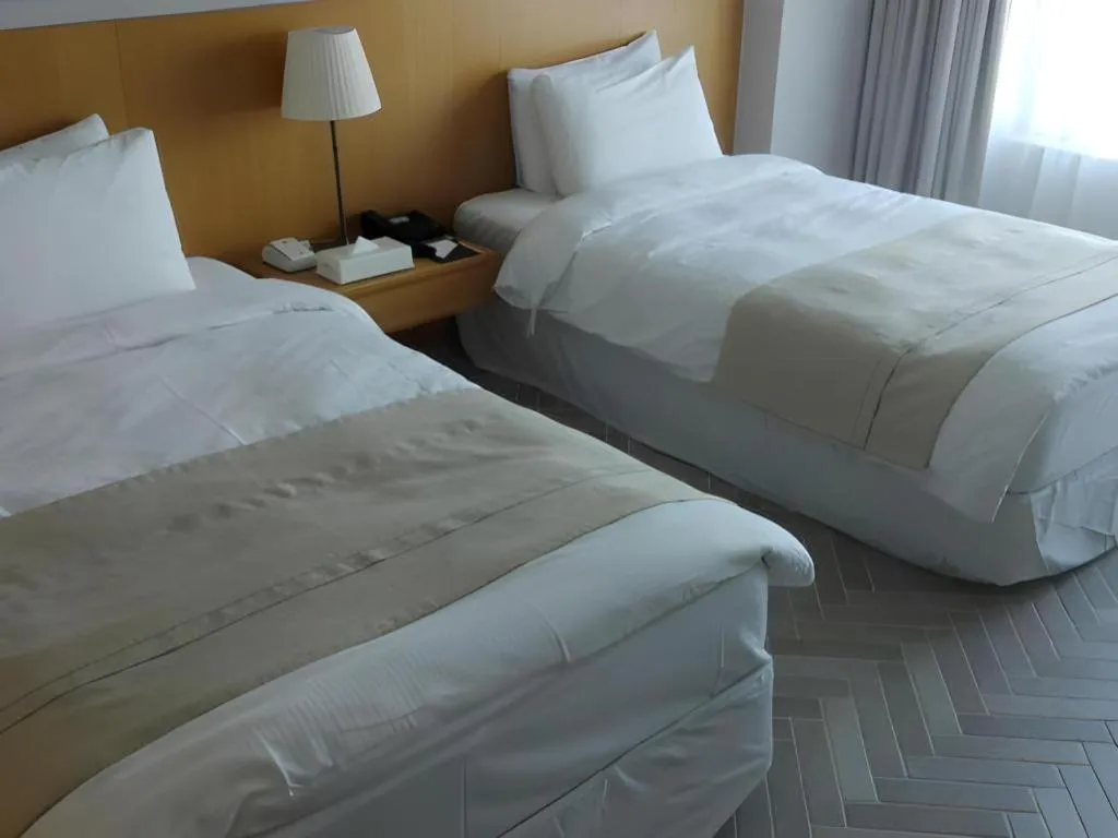 Bed in Hotel Illua