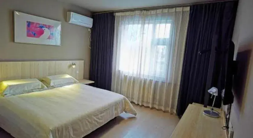 Bed in Jinjiang Inn Jinan Daming Lake Bed in Jinjiang Inn Jinan Daming Lake