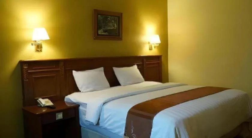 Bed in Madani Hotel Medan