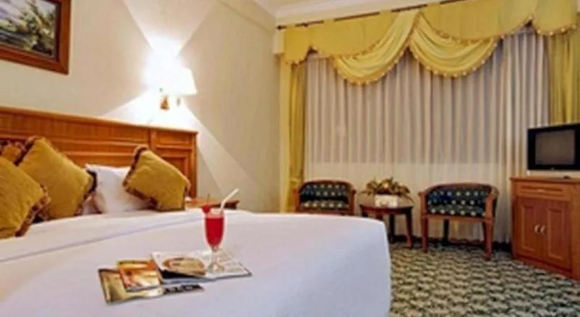 Bed in Madani Hotel Medan