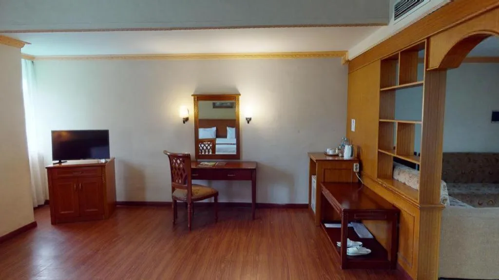 Bed in Madani Hotel Medan