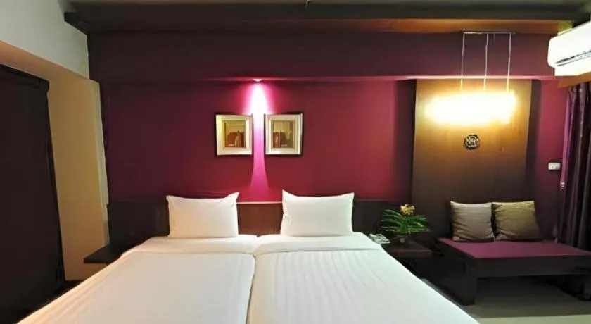 Bed in Bonito Chinos Hotel