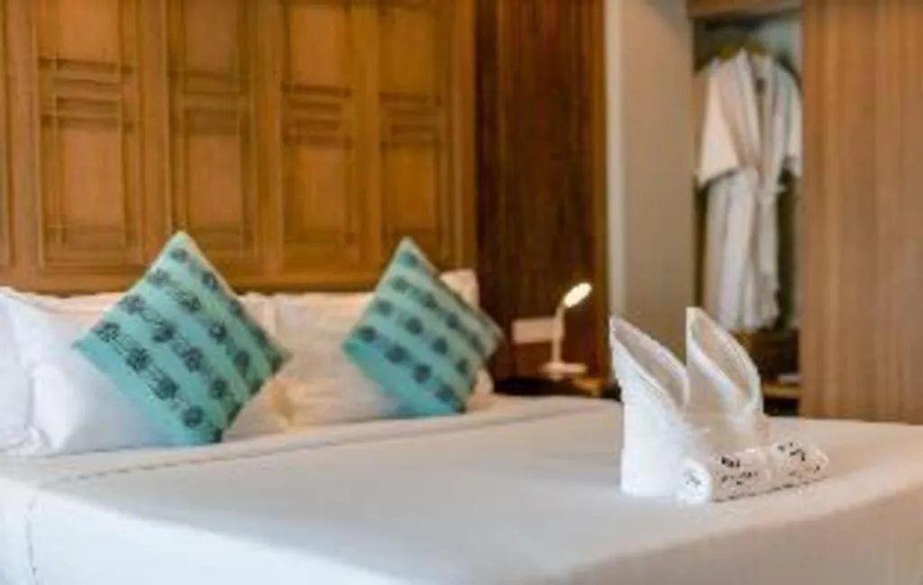 Bed in Bonito Chinos Hotel