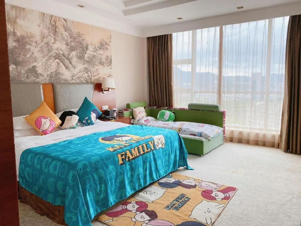 Bed in New Century Grand Hotel Ninghai Jinhai