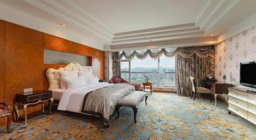 Bed in New Century Grand Hotel Ninghai Jinhai