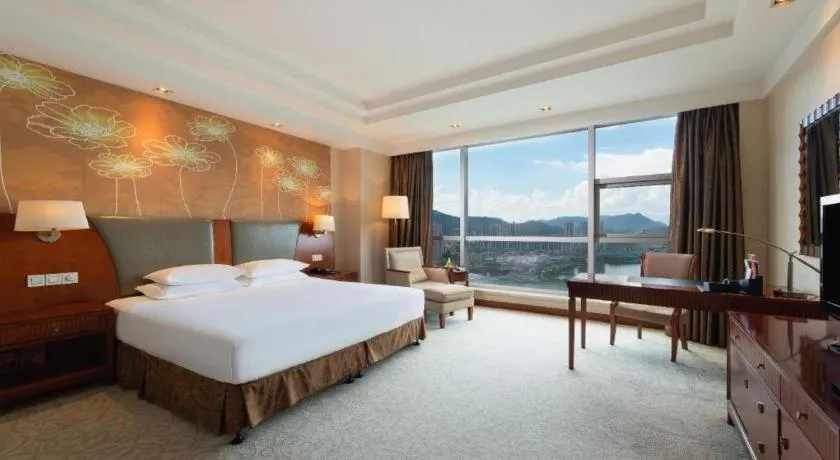 Bed in New Century Grand Hotel Ninghai Jinhai