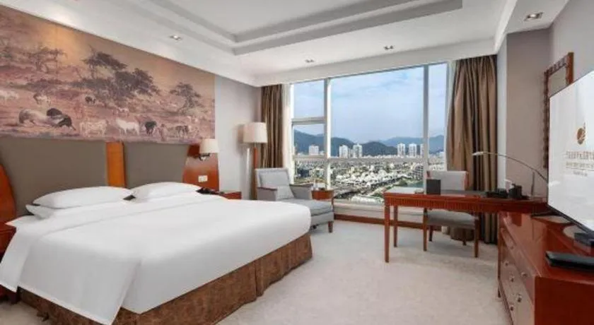 Bed in New Century Grand Hotel Ninghai Jinhai
