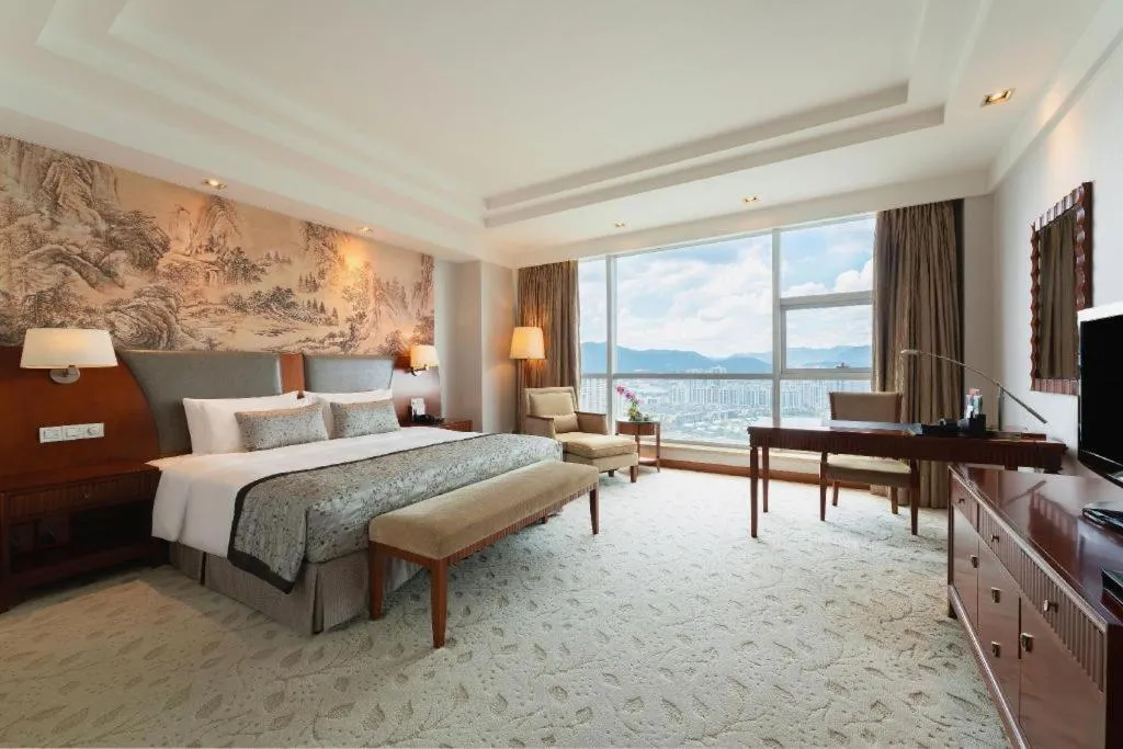 Bed in New Century Grand Hotel Ninghai Jinhai