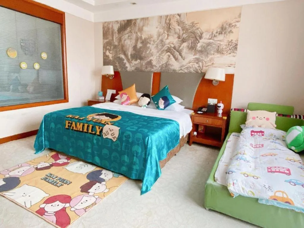 Bed in New Century Grand Hotel Ninghai Jinhai