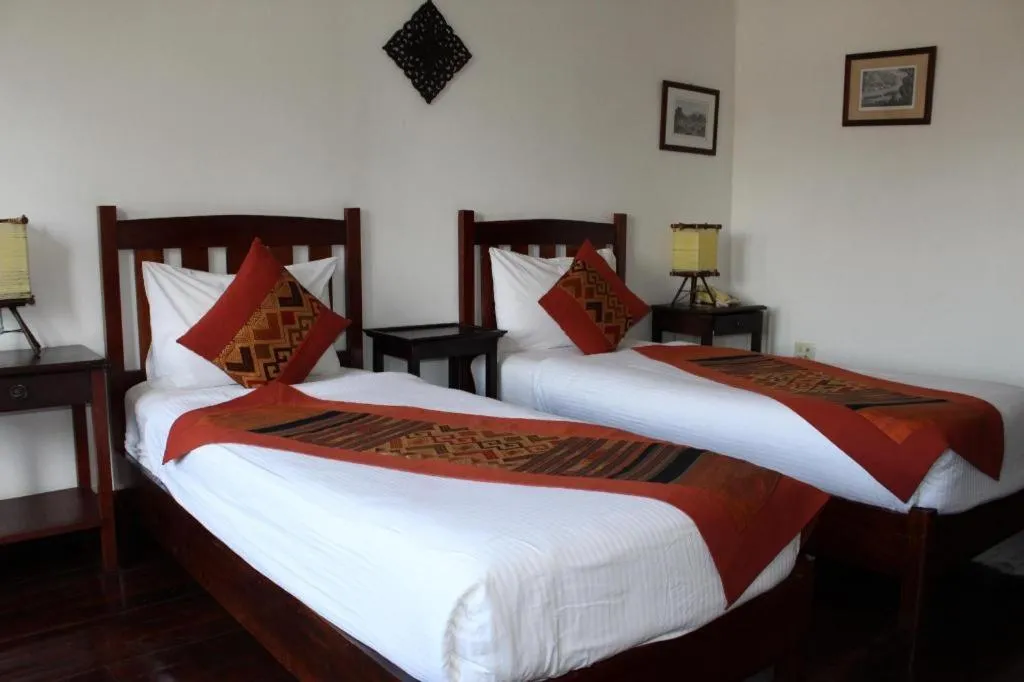 Bed in Residence Sisouk Boutique Hotel