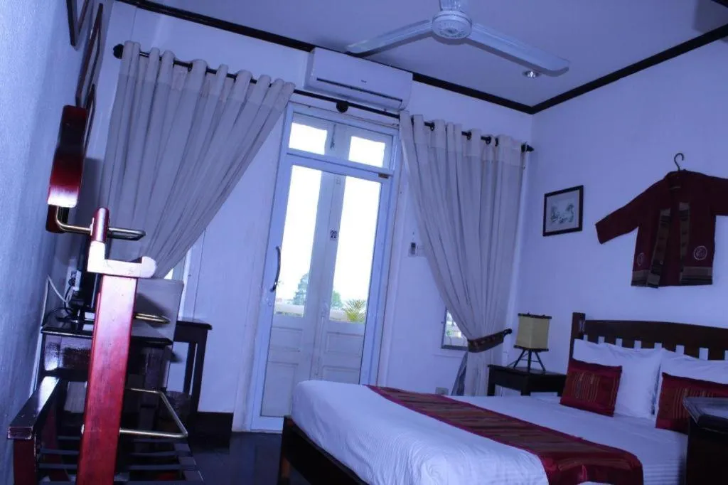 Bed in Residence Sisouk Boutique Hotel