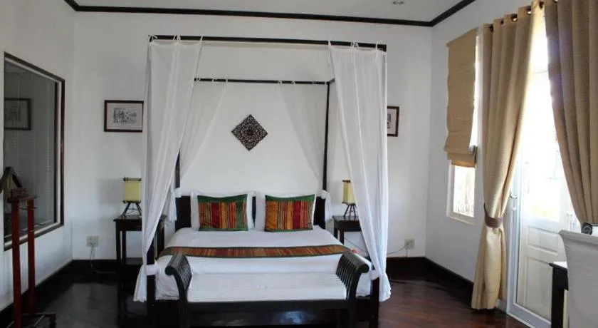 Bed in Residence Sisouk Boutique Hotel