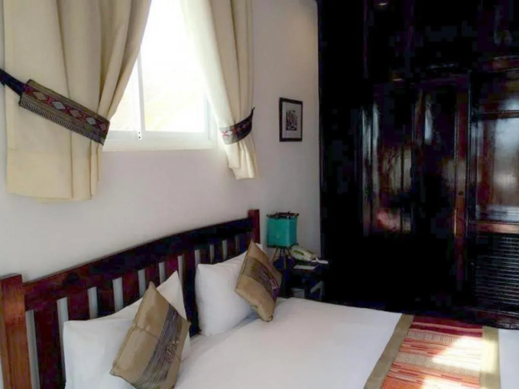 Bed in Residence Sisouk Boutique Hotel