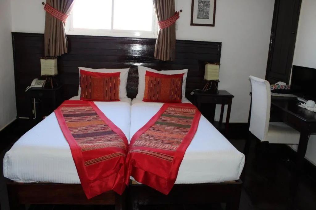 Bed in Residence Sisouk Boutique Hotel