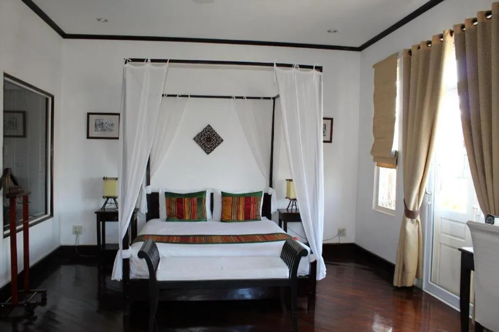 Bed in Residence Sisouk Boutique Hotel